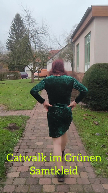 Catwalk in a green velvet dress.