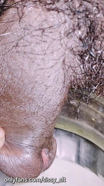 Must-see moment from "Limp little penis crossdresser pissing outdoor"