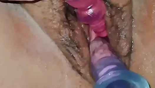 Greedy wife explores new sex toys (part 2): two vibrators in her pussy and butt plugs (both went in, the small and the big)