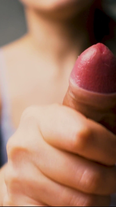 A beauty with red lips jerks off her boyfriend in close-up and brings him to the peak of pleasure. | Clip 1