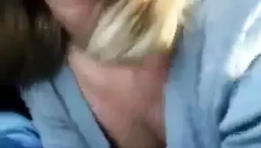 Hot blondie gives a nice car blowjob