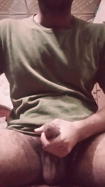 Solo guy masturbating and playing with his dick