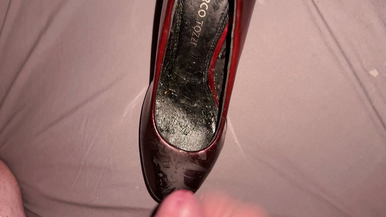 Cumming on red and black patents