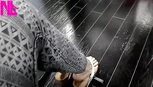 Shoeplay and Dangling in Cute White Flip Flops in a Store