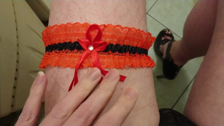 Red garter and black high heel sandals cum