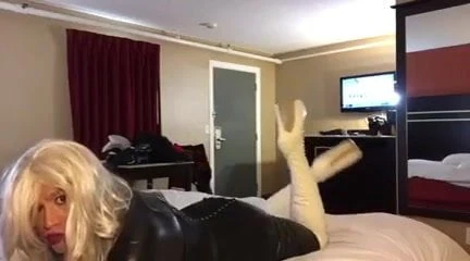 Crossdresser in catsuit, black cat