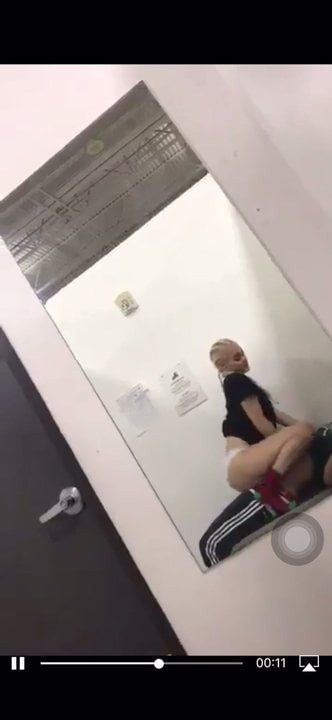 latina riding in dress room