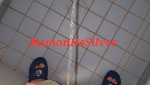 Master Ramon pisses in his hot satin shorts in the shower, slave lick it up!