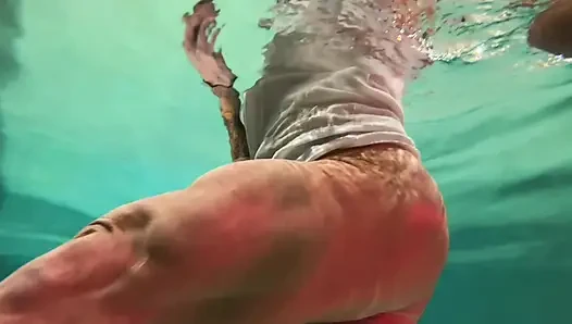 Amazon Kandy Flexes Her Massive Biceps in Her Hotel Pool