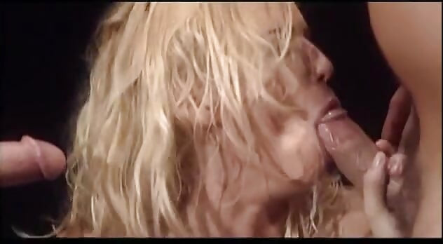 Blonde slut deep throats two cocks then gets double penetrated