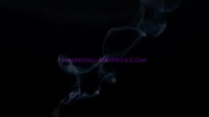 Smoking in satin pyjamas