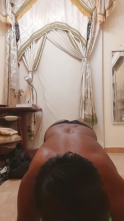 Gay men sexy gym at home with wear thong.
