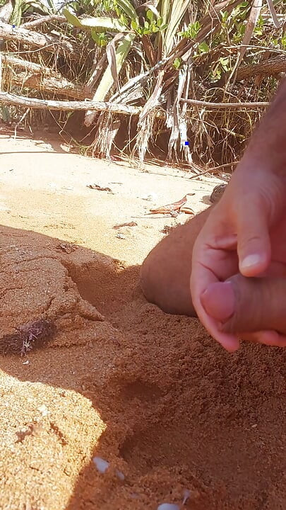 Ladysilva masturbating his cock on a deserted beach until he cums hot