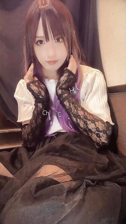 A video of a sexy cross-dresser with purple hair masturbating quietly