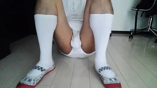 Anal masturbation by a young Japanese woman wearing a chastity belt