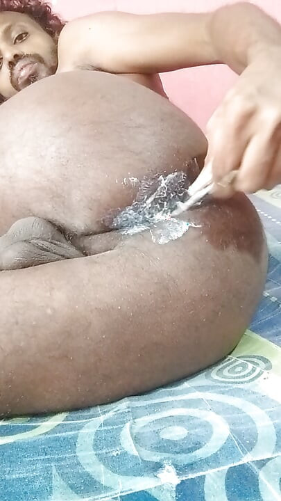 Inserting an iron into the rectum