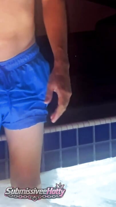Hanging out in swimsuit at rooftop bar at night party
