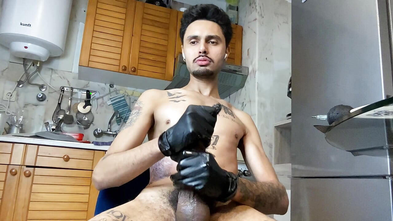 Skinny guy with a big, thick dick getting a tattoo and then jerking off.