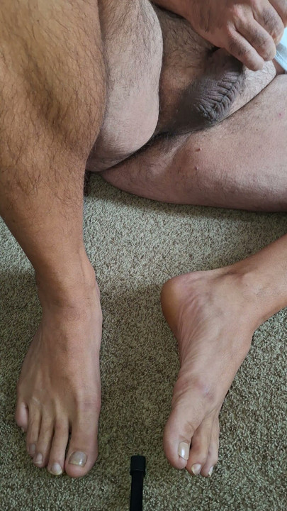 Massaging my balls and playing with my cock barefoot