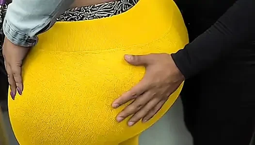 "Masked BBW Teases Huge Ass in Shiny Yellow Leggings on Public Bus"