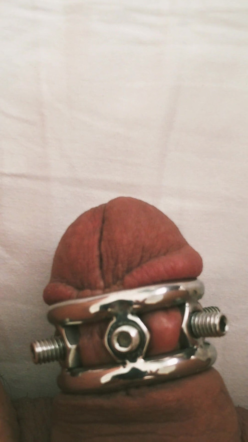 My small, inferior cock wears the crown of thorns. The spikes dig deep into my flesh.