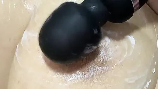 Mom vibrates her big tits with her big vibrator