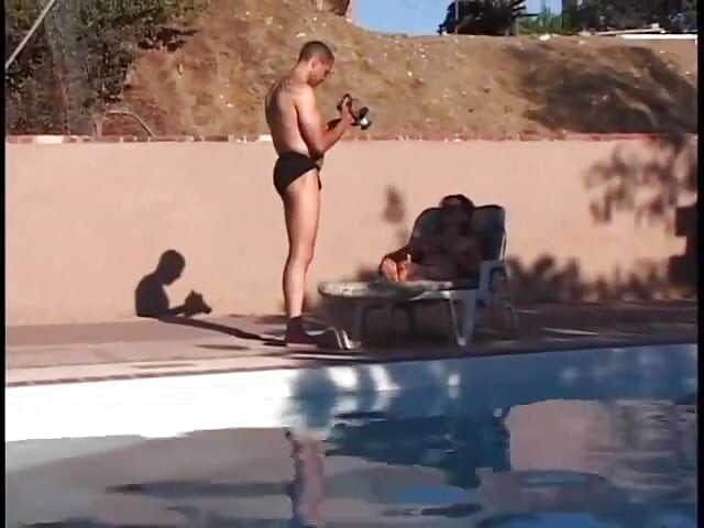 Group of guys by the pool all take turns fucking the brunette