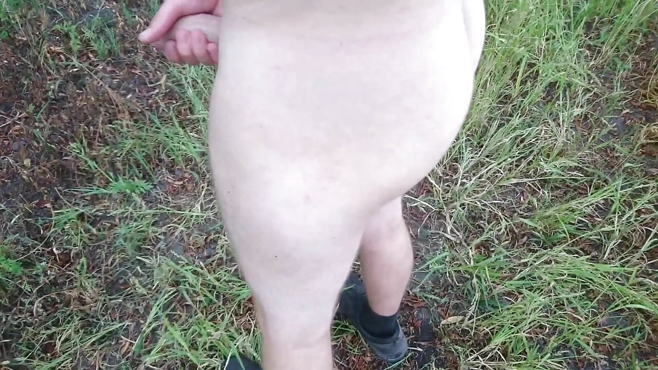 Naked Guy Pisses a Lot Outdoors Then Jerks Off and Cums