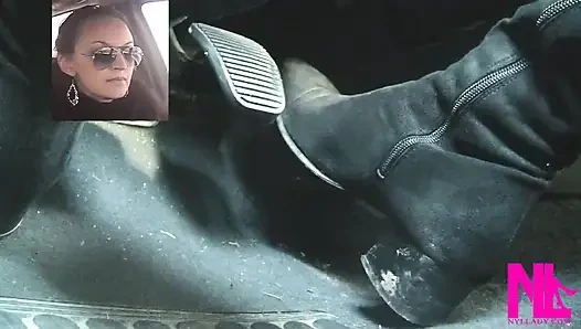 Mengemudi cepat dengan sepatu bot tinggi suede knee hitam