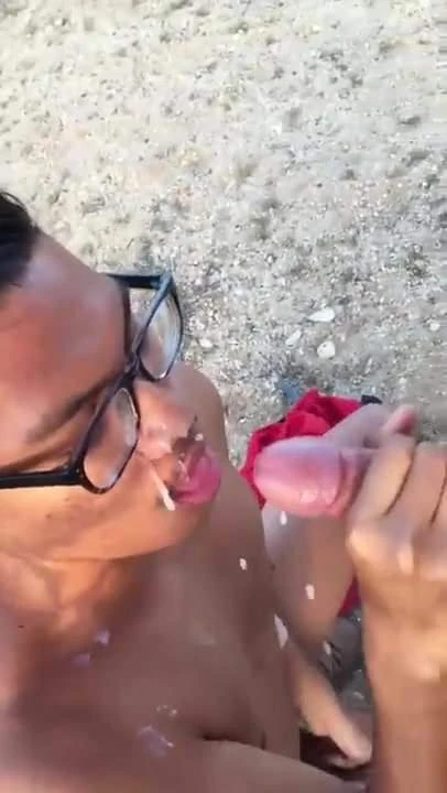 Blowjob on the Beach