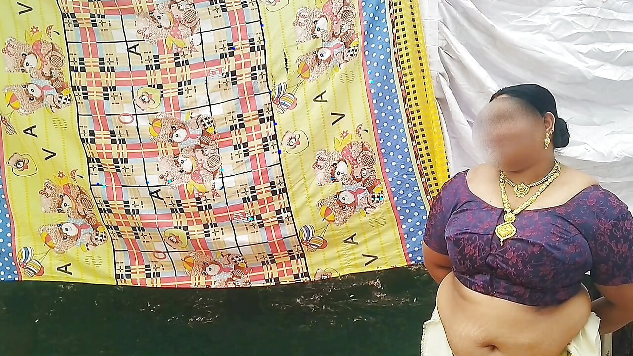 Traditional kerala style dressed Bhabi showing her huge sexy boobs, walking topless