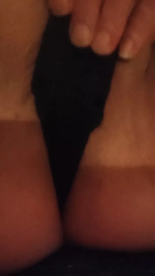 Masturbating