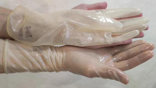 Transparent fetish gloves trying on