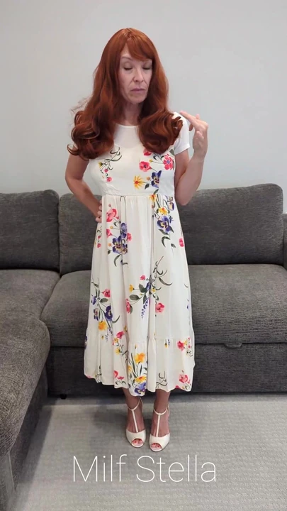 A Redhead In A Dress