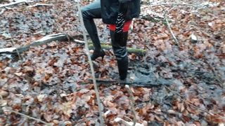 Red catsuit, thigh high boots and deep mud!!!
