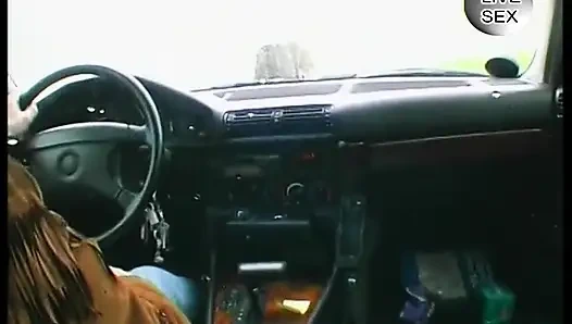 Blonde girl lets her boyfriend finger her in the car