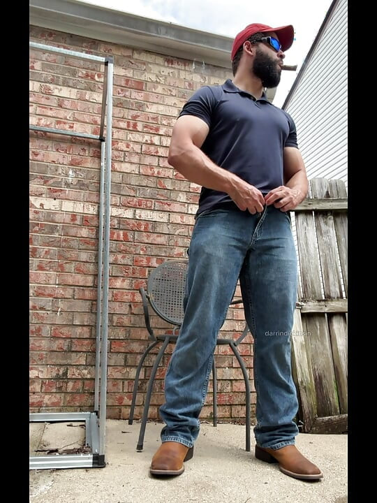Booted Bearded Fella Cigar and Edge Out Back