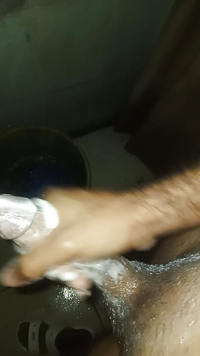 Slim man grabs his penis as a toy and starts masturbating all the time he was in the bathroom while they were not at home alone