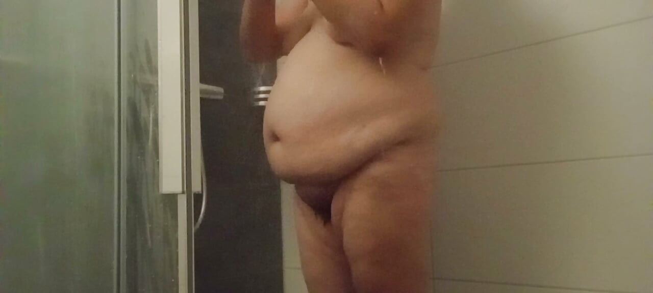 53 year old BBW showers her hairy pussy and big belly