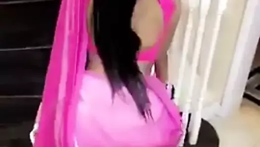 Twerking in her pink sari