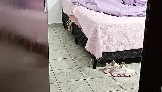 Stepfather helps stepdaughter take off her clothes to go to bed.