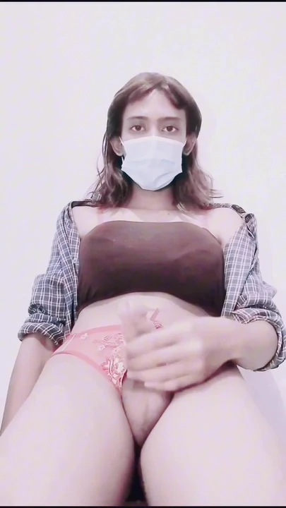Emotional moment from "Tiny Asian CD Sissy Trans Masturbation After Work"