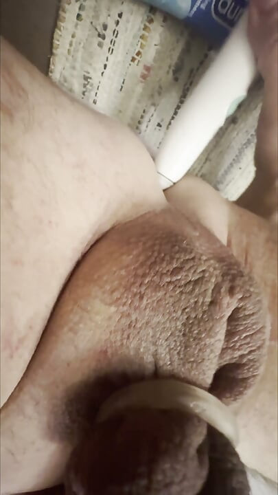 Bathroom enema, pissing and then ass play to orgasm