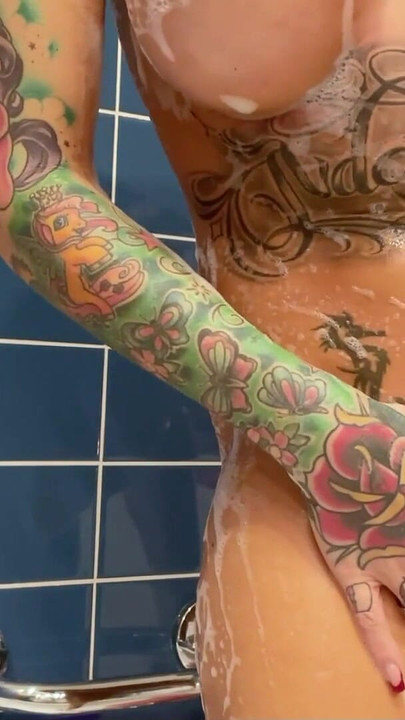 Captivating moment from "German Amateur Teen Anni Angel - Shower pussy shaving with close-up"