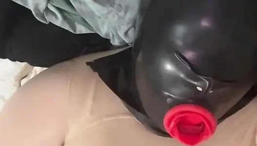 Condom Mask Encased Orgasm