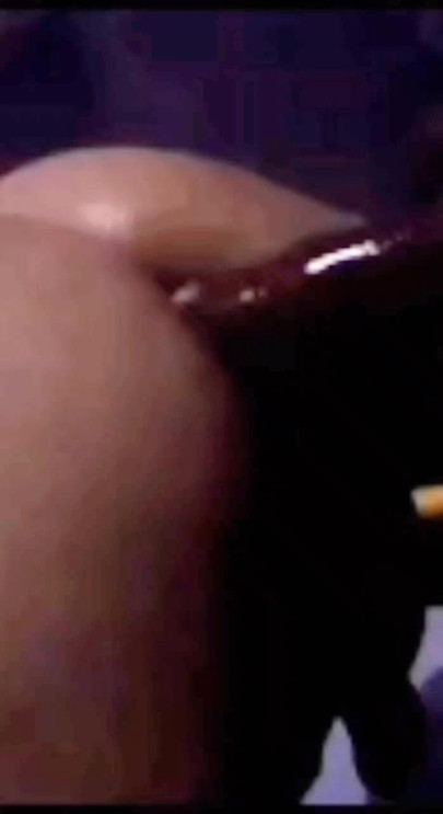 Bubble butt bouncing on black dildo