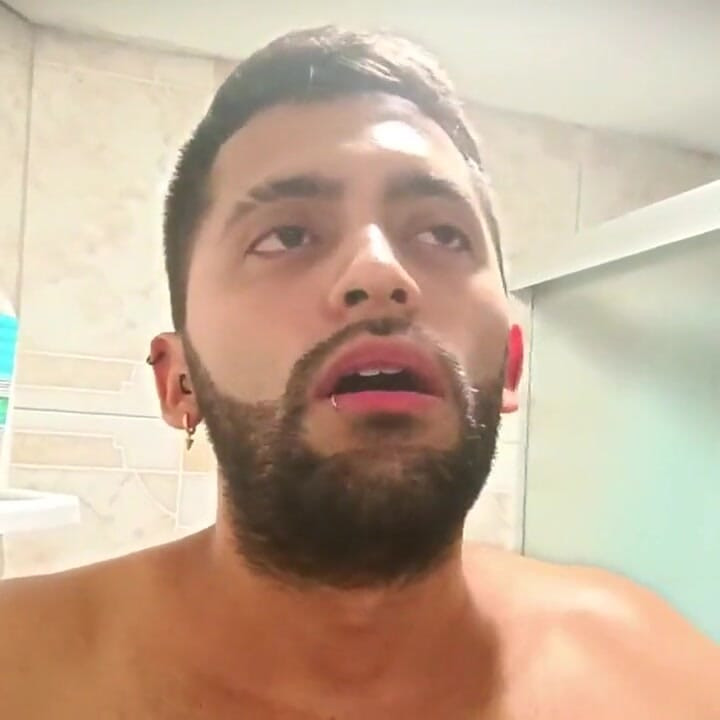 No hands water masturbation. Letting the stream of water fall on my big uncut Latino cock until it makes me cum.