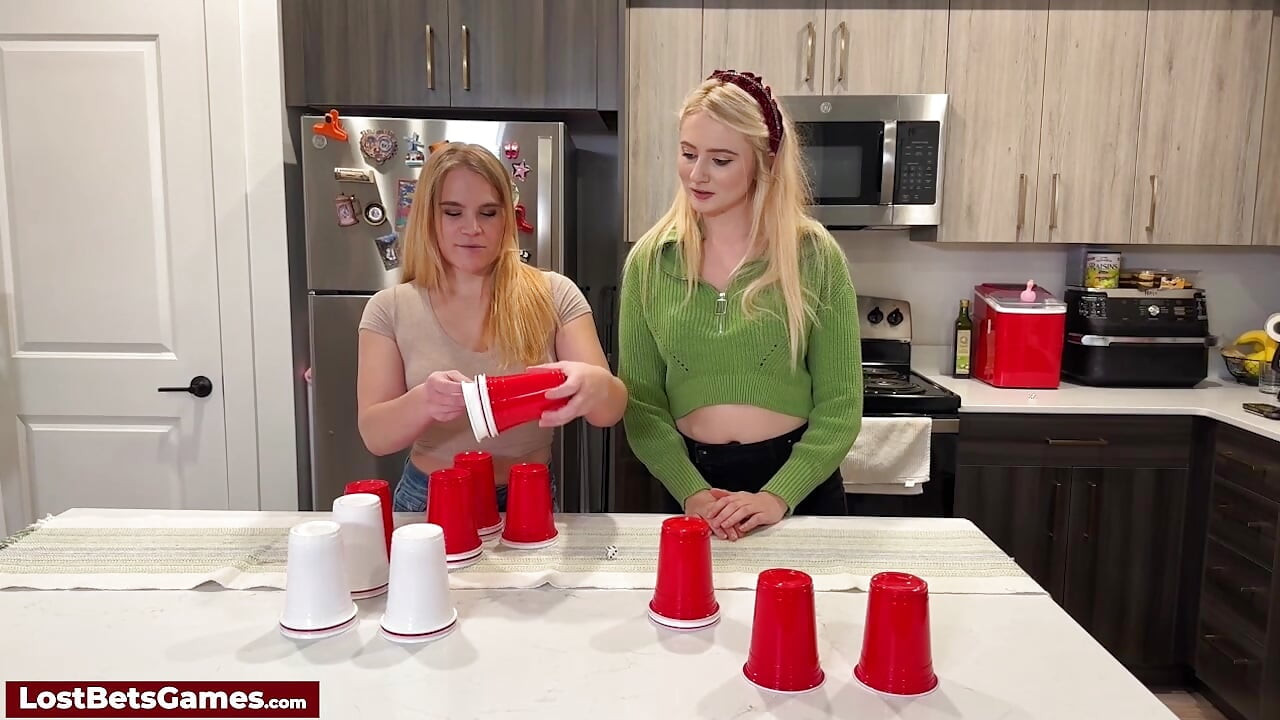 Taylor pairs with Maddie for a playful strip dice cup game