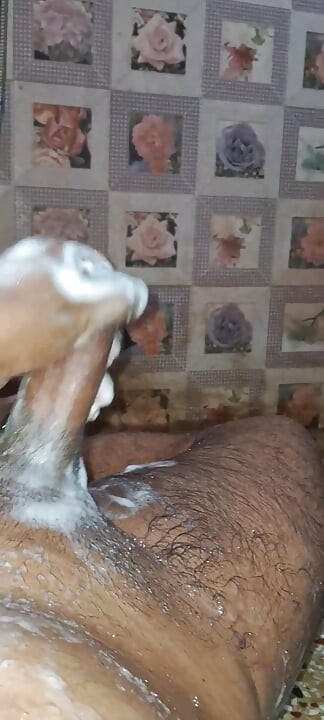 A Young Hindu Boy From India Is Fucking His Thick Cock Hard with His Hands While Taking a Bath