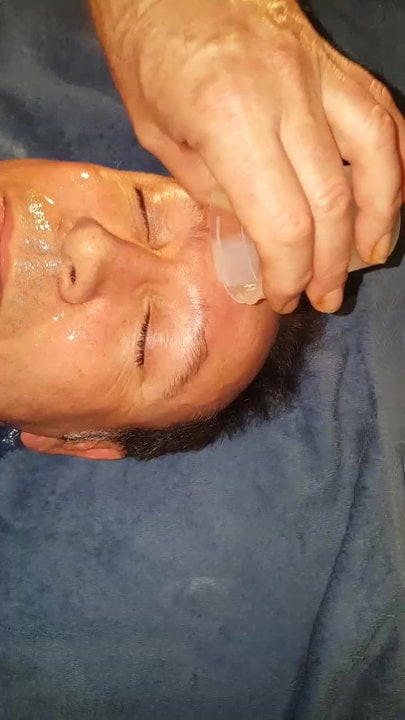 Extending his cum on my face